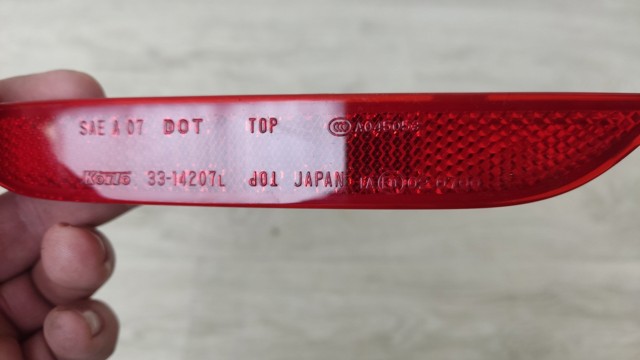 Левый катафот заднего бампера 265656CA0A NISSAN