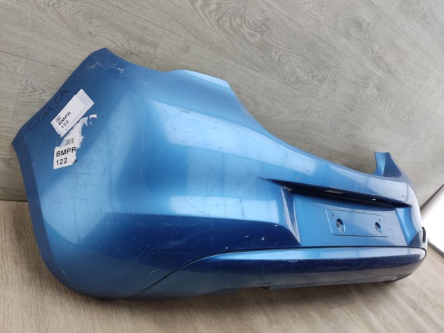 Бампер задний 39002839 OPEL
