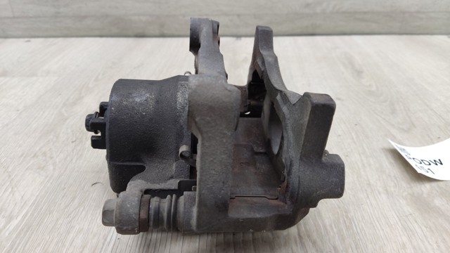NISSAN 410113TA0C Суппорт тормозной передний левый в наличии Ирпень