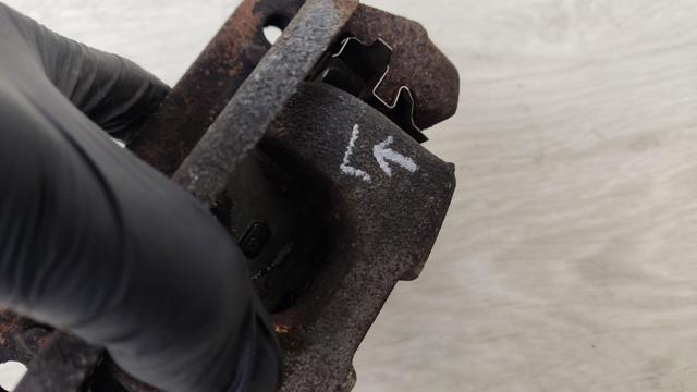 Задний левый суппорт 440113NK0A NISSAN