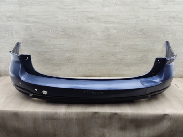 Задний бампер 57704SG010 SUBARU