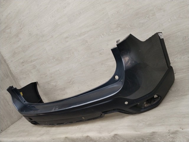 Задний бампер 57704SJ310 SUBARU