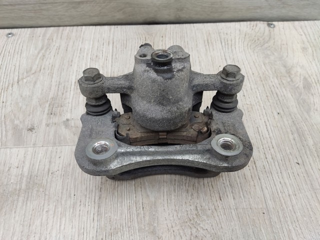 58230C1150 HYUNDAI Суппорт тормозной задний правый купить в Одесса