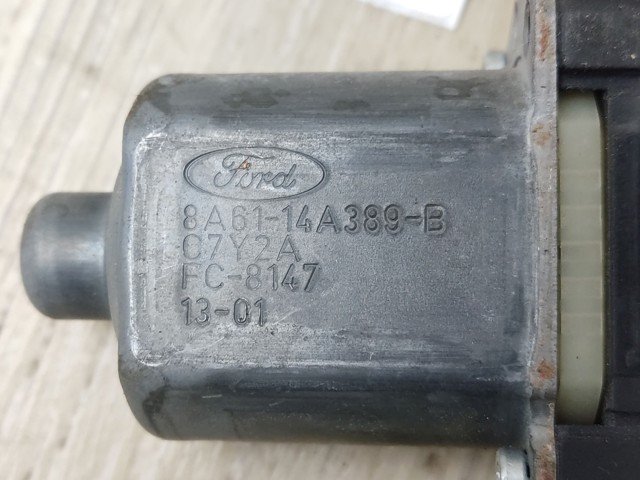 Мотор стеклоподъемника двери передней, левой 8A6114A389B FORD