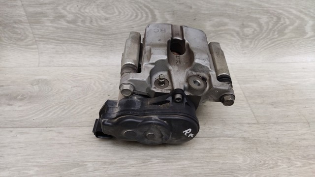 D40006RA0C NISSAN Суппорт тормозной задний правый купить в Киев