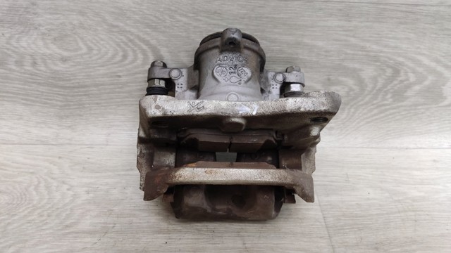 Задний левый суппорт D40106RA0C NISSAN