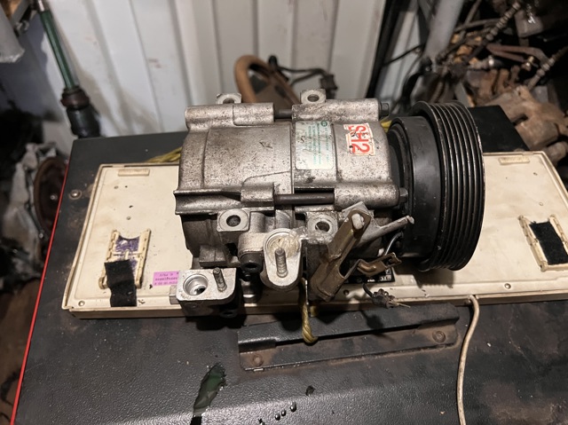 Компрессор климатической установки 9770126010 HYUNDAI