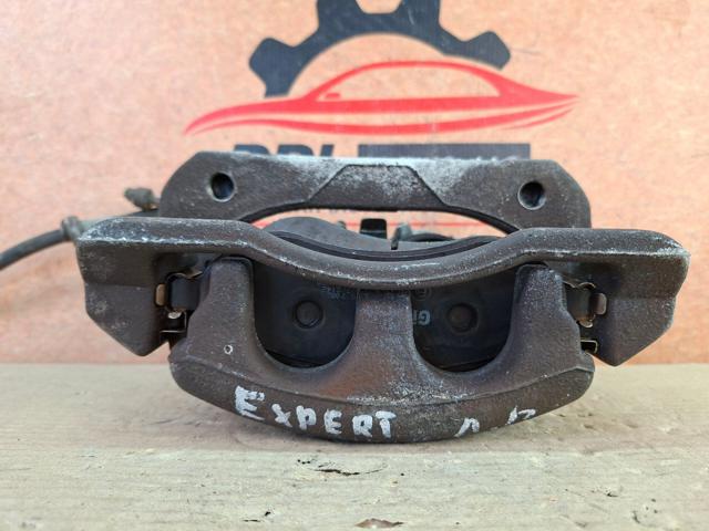32410034 PEUGEOT Суппорт тормозной передний левый купить в Полтава