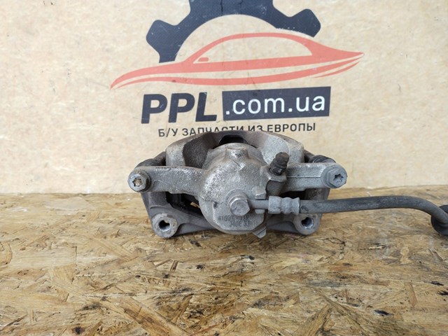 410012354R RENAULT Суппорт тормозной передний правый купить в Житомир