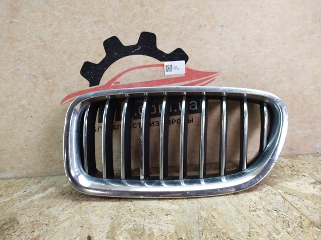 Решетка радиатора левая 7412323 BMW