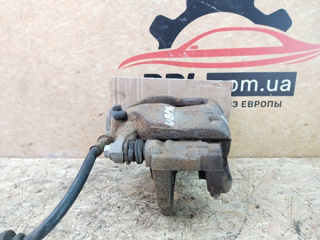 GM 93189802 Суппорт тормозной передний правый в наличии Киев
