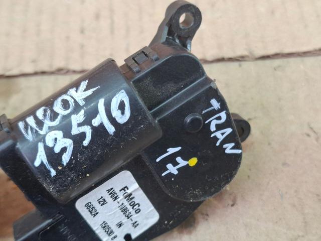 Привод системы автоматического управления отопителем AV6N19B634AA FORD