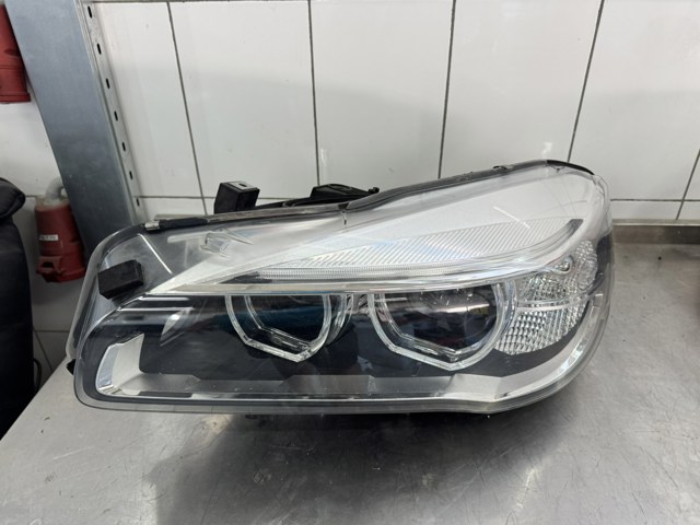 7391401 BMW Фара левая купить в Львов