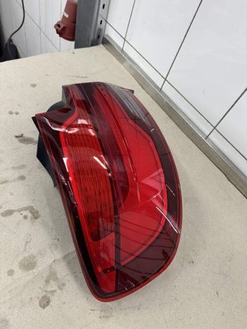 7420991 BMW Фонарь задний левый купить в Львов