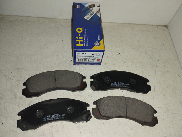 Колодки тормозные передние дисковые SP1068 SANGSIN