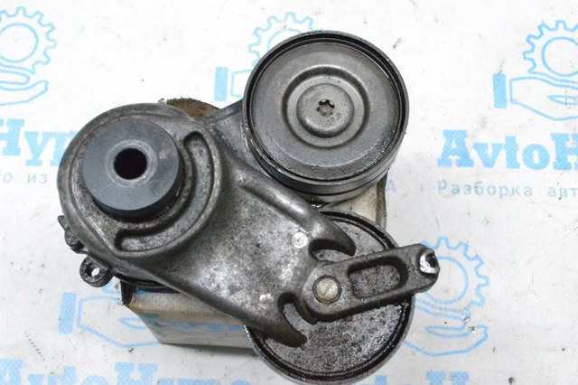 Натяжитель клинового ремня 06M903133R VAG