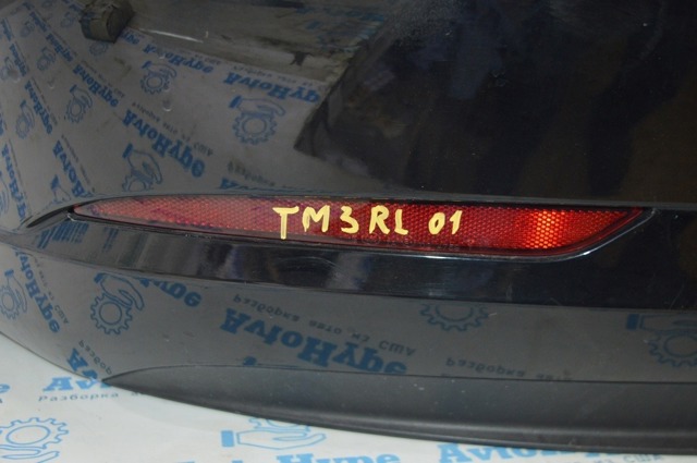 TESLA 107740600F Катафот (отражатель) заднего бампера левый в наличии Харьков