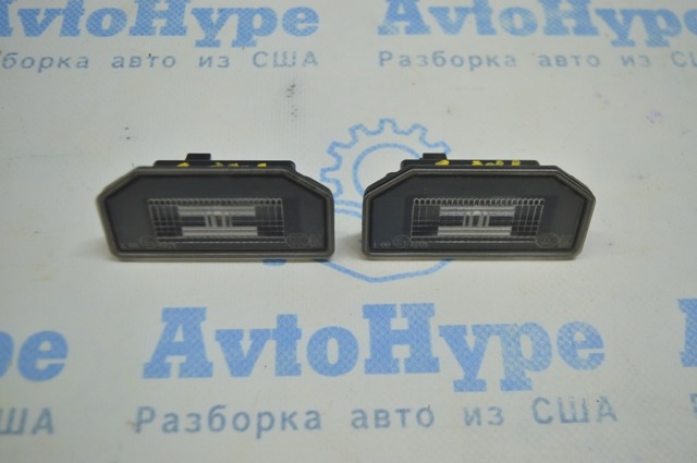 Фонарь освещения номерного знака Тесла Модел 3