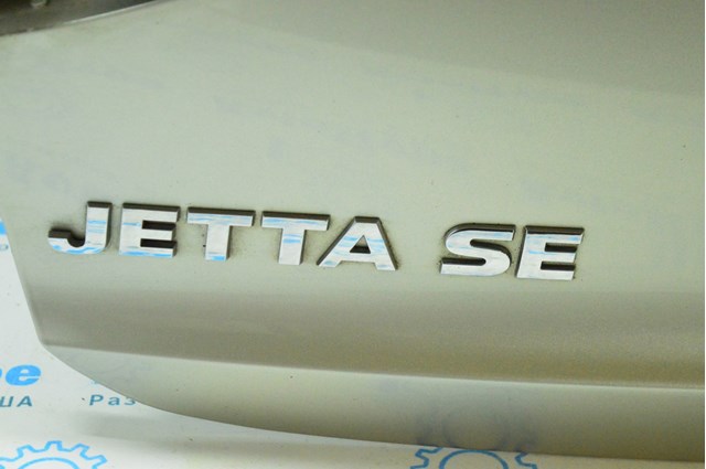 Эмблема надпись "jetta" крышки багажника vw jetta 19- 17a-853-687-2zz 17A-853-687-2ZZ