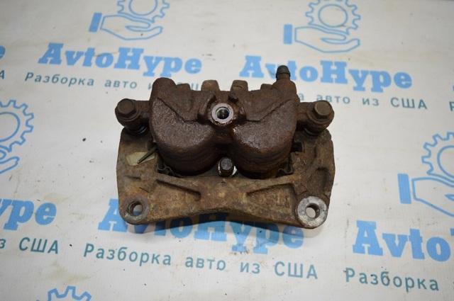 Суппорт тормозной, передний, левый 26292SC031 SUBARU