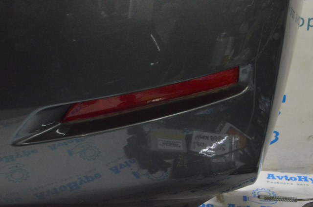 Правый катафот заднего бампера 265608990B NISSAN