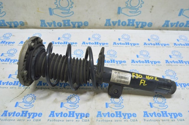 Амортизатор передний левый 31316873803 BMW
