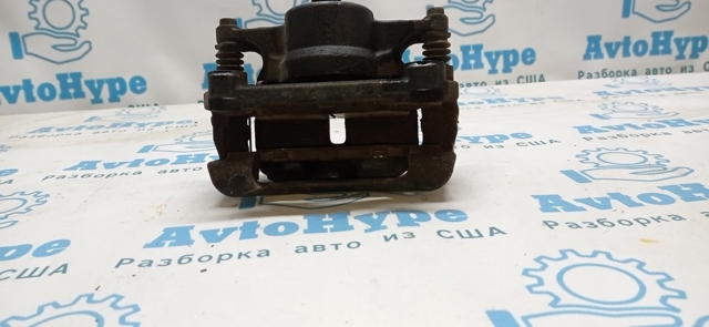 410114BT0A NISSAN Суппорт тормозной передний левый купить в Ужгород
