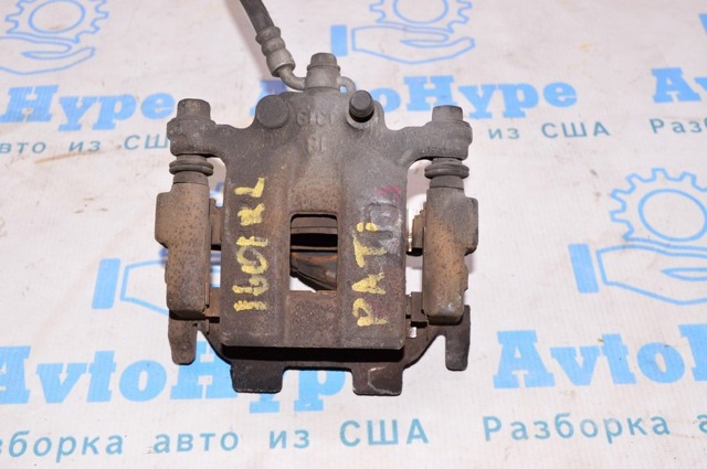 Задний левый суппорт 440111AA0A NISSAN