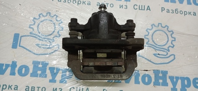 Суппорт тормозной левый задний 440113NF0A NISSAN