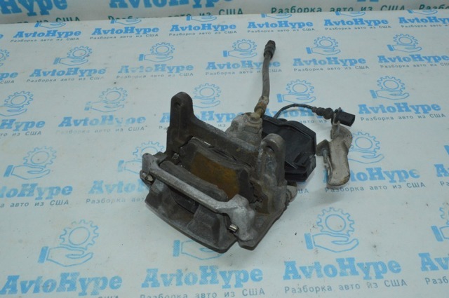 Суппорт тормозной левый задний 4M0615403A VAG