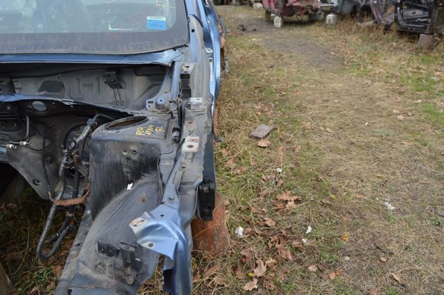 Кронштейн крепления крыла переднего левого, передний 57160SG0109P SUBARU