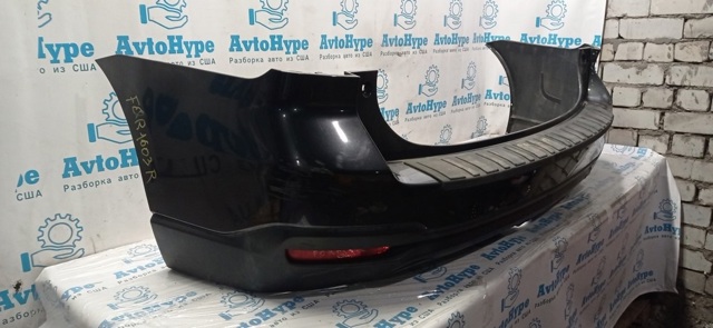 Задний бампер 57704SG012 SUBARU