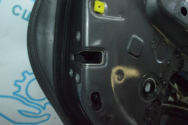 Замок двери задней левой 69060AC030 TOYOTA
