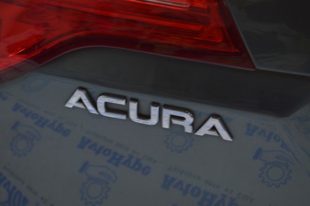 Фирменный значок 75711STXA01 HONDA