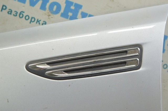 Накладка переднего левого крыла 87771D4000 HYUNDAI