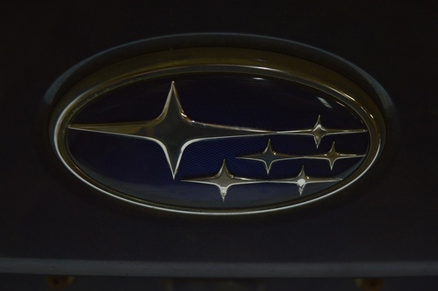 Эмблема на крышку багажника 93033AL040 SUBARU