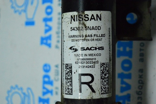 Стойка передняя правая E43025NA0D NISSAN