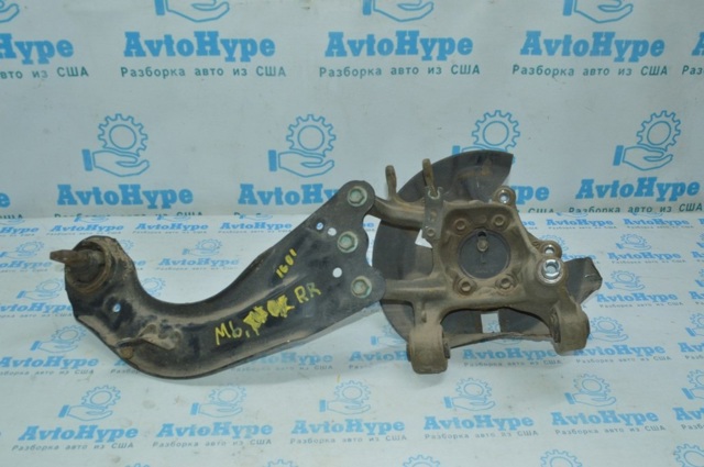 Цапфа (поворотный кулак) задний правый GHR12611XB MAZDA