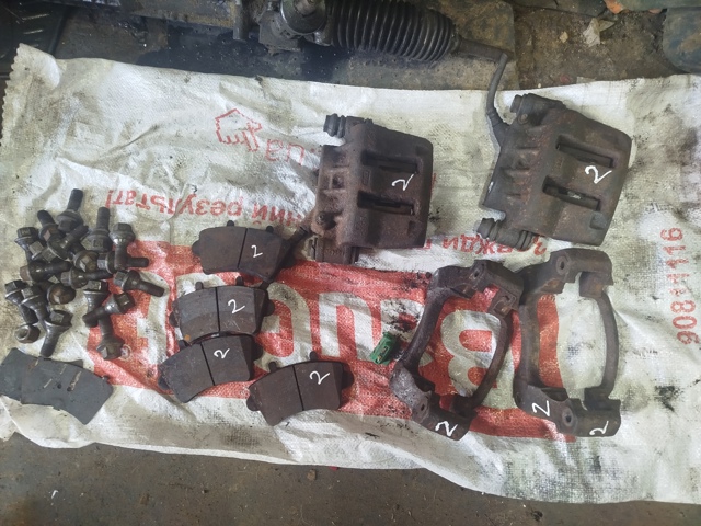 7701208013 RENAULT Суппорт тормозной передний правый купить в Ирпень