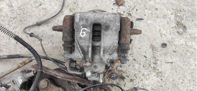 7711135703 RENAULT Суппорт тормозной задний правый купить в Николаев