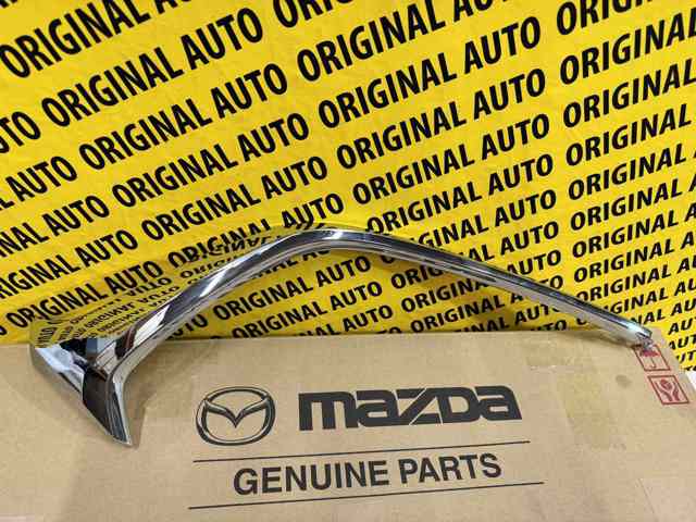 MAZDA D10J507K0C Молдинг бампера переднего левый в наличии Одесса