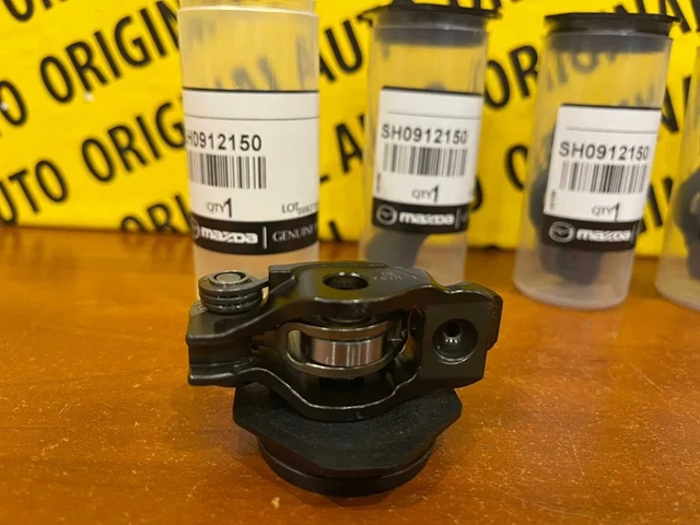 SH0912150 MAZDA Коромысло клапана (рокер) выпускной купить в Житомир