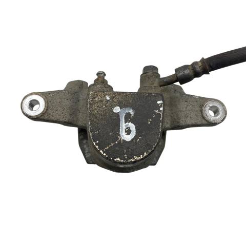 582302W000 HYUNDAI Суппорт тормозной задний правый купить в Украина