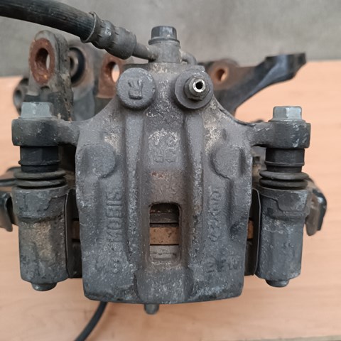 Суппорт тормозной задний правый 582302Y500 HYUNDAI