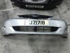 Передний бампер 57702FG090 SUBARU