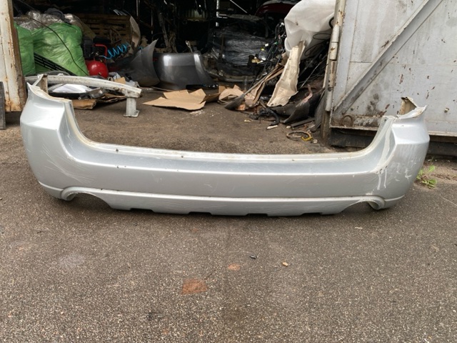 Бампер задний 57704AG060 SUBARU
