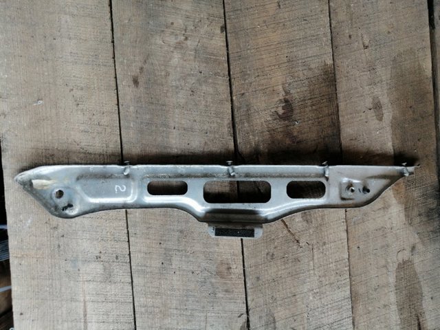 Левое крепление переднего бампера 57707AG010 SUBARU
