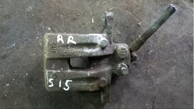 Задний правый суппорт 582302Y300 HYUNDAI