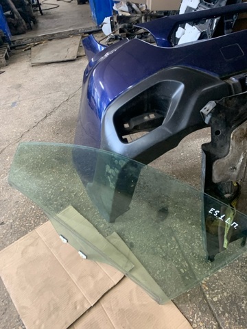 Стекло водительской двери 61011AL010 SUBARU
