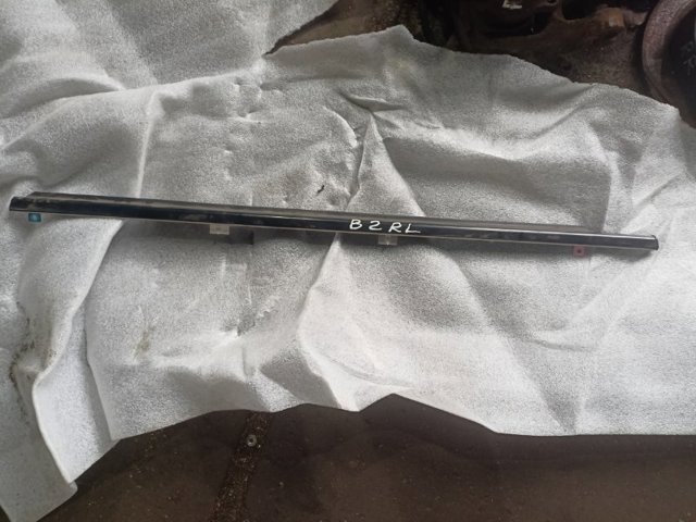 Молдинг задней левой двери 63301FC011 SUBARU